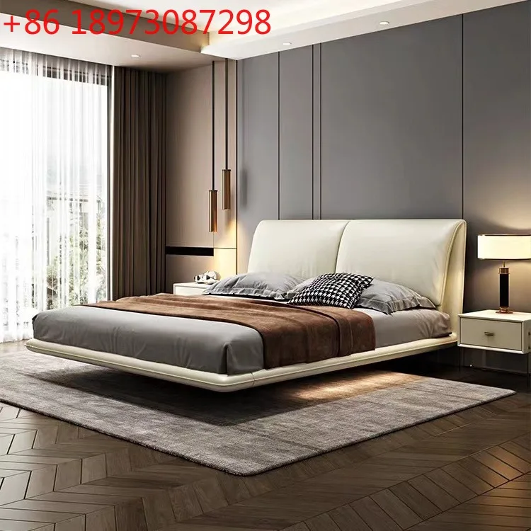 Italian minimalist leather suspension master bedroom soft bag household solid wood
Italian minimalist leather suspension master bedroom soft bag household solid wood