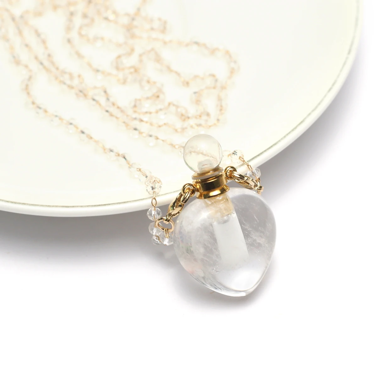 Heart Shape Natural Clear Quartz Perfume Bottle Pendant Necklace Women Essential Oil Diffuser Charms for Jewerly Party Gift
Heart Shape Natural Clear Quartz Perfume Bottle Pendant Necklace Women Essential Oil Diffuser Charms for Jewerly Party Gift