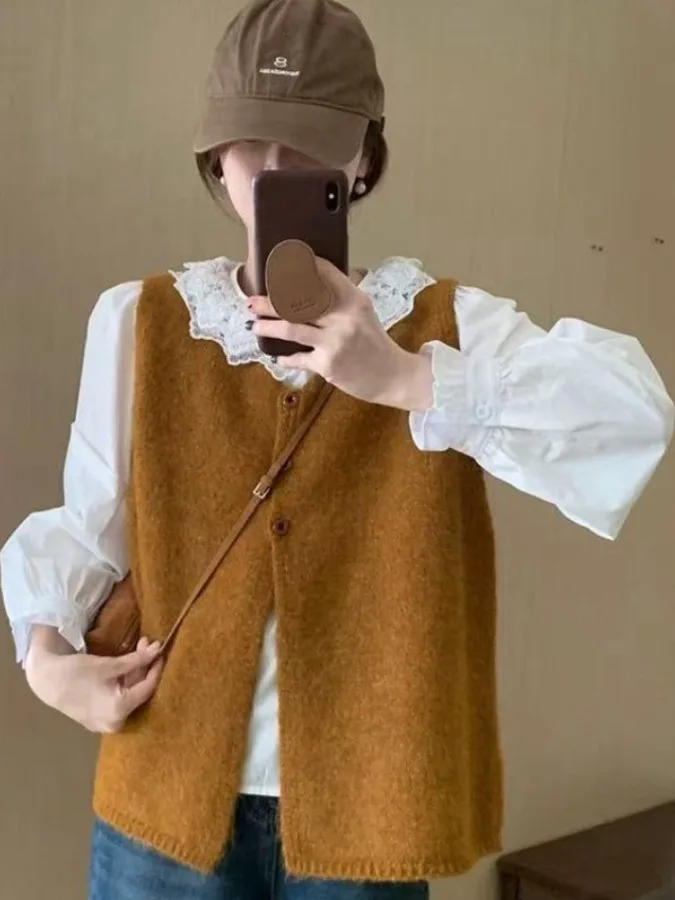 Простой вязаный жилет в стиле ретро, женский многослойный корейский универсальный ор-пальто, внутренняя одежда, модная осенне-зимняя новинка...
Простой вязаный жилет в стиле ретро, женский многослойный корейский универсальный ор-пальто, внутренняя одежда, модная осенне-зимняя новинка...