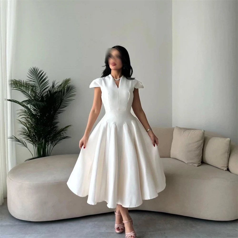 Customized Classic White Satin V-Neck Off the Shoulder Sleeveless Prom Gowns Fashion Fashion Ball Gowns Tea Length Evening Dress
Customized Classic White Satin V-Neck Off the Shoulder Sleeveless Prom Gowns Fashion Fashion Ball Gowns Tea Length Evening Dress