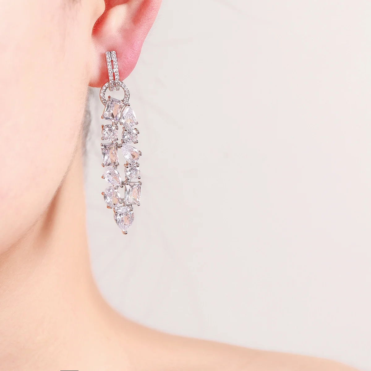 Silver Tone Long Drop Earrings with Mixed-Cut Pink Gemstones and Clear Rhinestone Accents for Women Evening Party
Silver Tone Long Drop Earrings with Mixed-Cut Pink Gemstones and Clear Rhinestone Accents for Women Evening Party