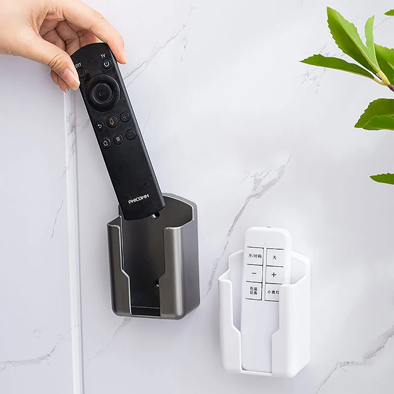 Remote Control Holder Wall Mounted Storage Box Cosmetic Bathroom Rack Shelf Adhesive Storage Home Mobile Phone Plug Case
Remote Control Holder Wall Mounted Storage Box Cosmetic Bathroom Rack Shelf Adhesive Storage Home Mobile Phone Plug Case