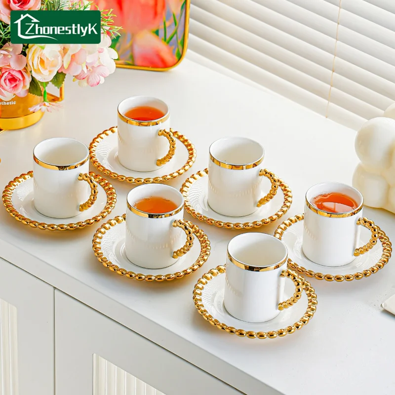 Набор из 6 мини-кружек для кофе в европейском стиле с жемчужным золотым ободком, ретро-кружки для офиса, чаепития, домашняя посуда для напитков
Набор из 6 мини-кружек для кофе в европейском стиле с жемчужным золотым ободком, ретро-кружки для офиса, чаепития, домашняя посуда для напитков