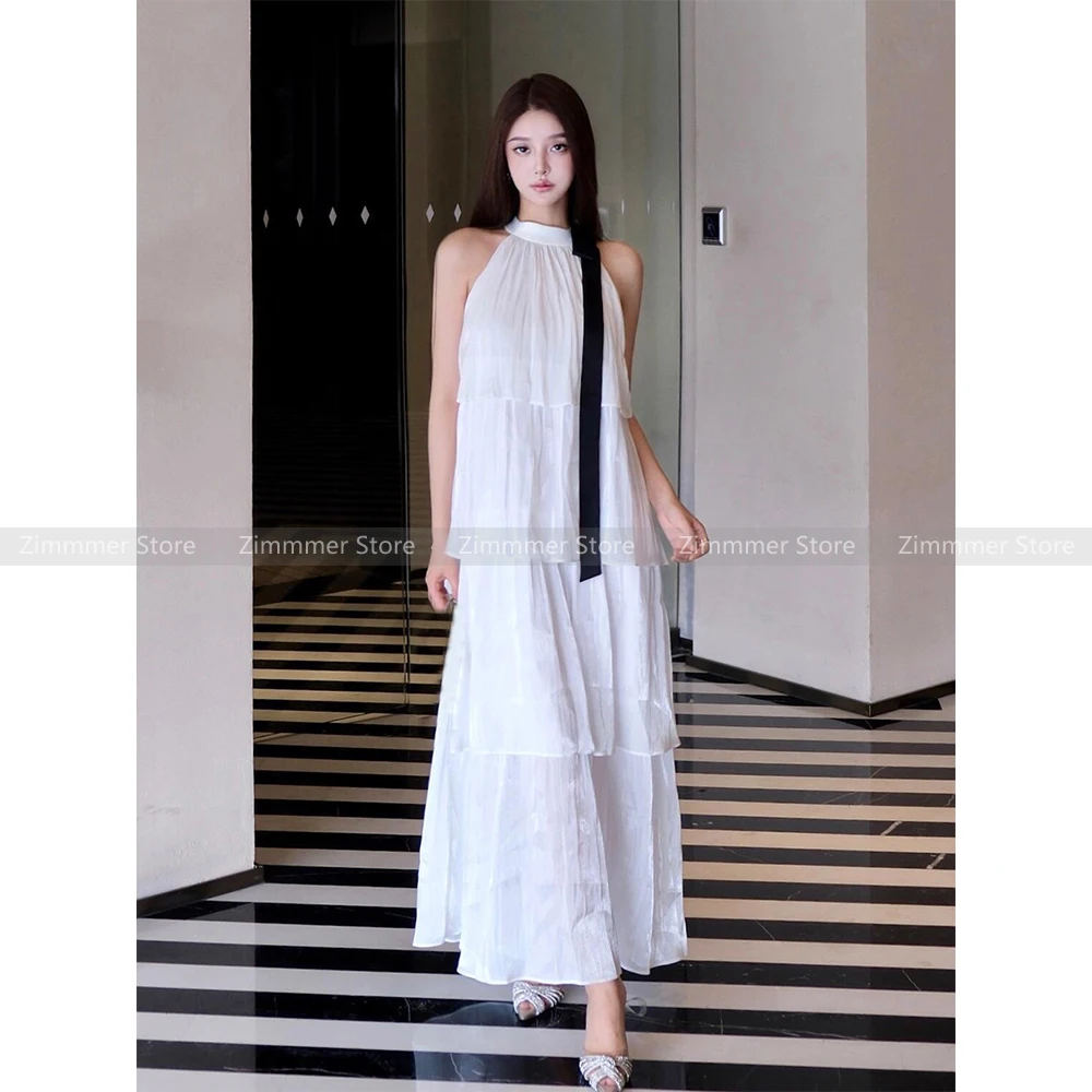 French seaside holiday hanging neck cake dress female 2024 summer new temperament super fairy long skirt
French seaside holiday hanging neck cake dress female 2024 summer new temperament super fairy long skirt