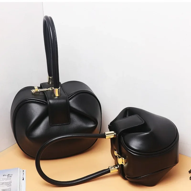 New Niche Fashion Clutch Bag Round Crossbody Genuine Leather Women's Handbag Round Bucket Bag Hand-held Small Round Design
New Niche Fashion Clutch Bag Round Crossbody Genuine Leather Women's Handbag Round Bucket Bag Hand-held Small Round Design