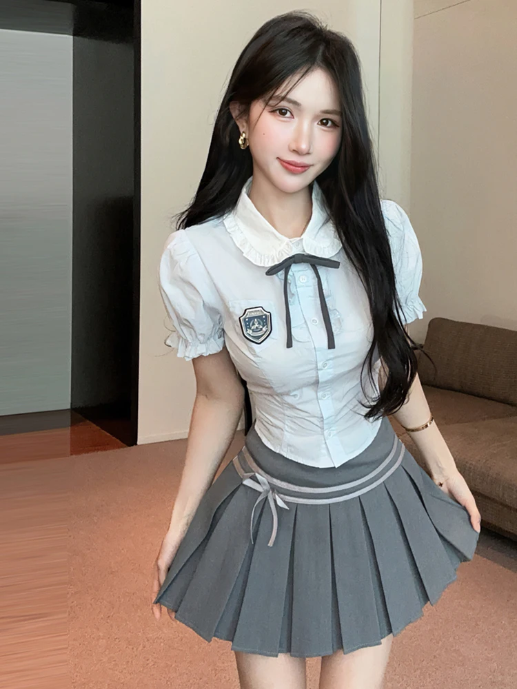 Korean Style College Preppy Uniform Short Sleeve Bubble Sleeve Shirt with Bowtie High Waist Pleated Skirt Two Piece Set
Korean Style College Preppy Uniform Short Sleeve Bubble Sleeve Shirt with Bowtie High Waist Pleated Skirt Two Piece Set