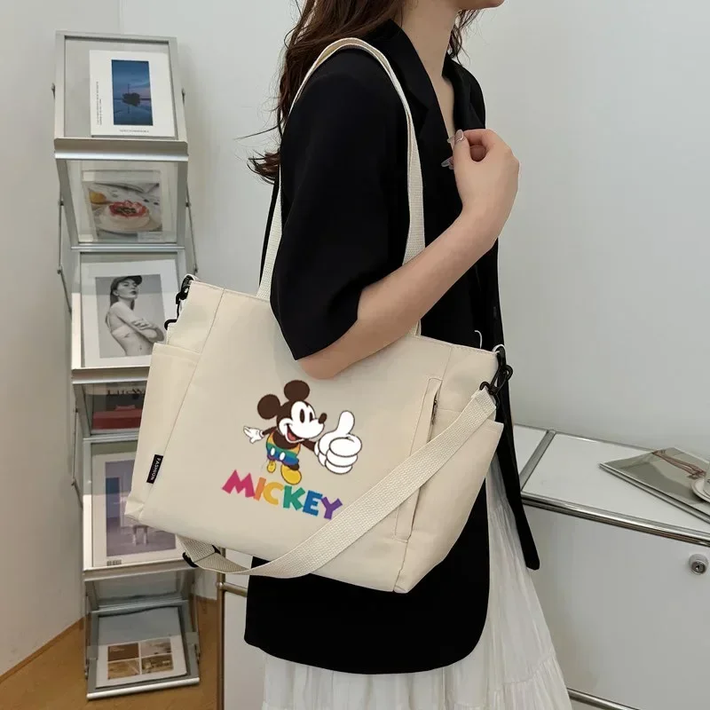 Disney Mickey Mouse Female Large Capacity Shoulder Messenger Bag Cute New Cartoon Handbag Student storage Tote Bag
Disney Mickey Mouse Female Large Capacity Shoulder Messenger Bag Cute New Cartoon Handbag Student storage Tote Bag