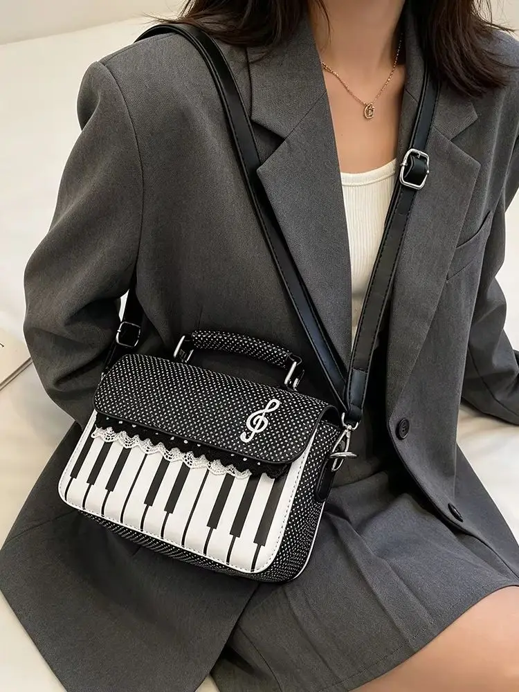 College Style Piano Key Small Square Bag Shoulder Bag Black White Polka Dot Lace Bow Crossbody Bag Sweet Fashionable Handbag
College Style Piano Key Small Square Bag Shoulder Bag Black White Polka Dot Lace Bow Crossbody Bag Sweet Fashionable Handbag
