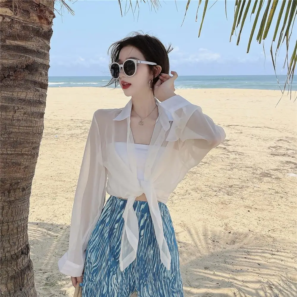 Thin Transparent Shirt Women's Summer Turn-down Collar Long-sleeved Lace-up Short Chiffon Top Fashion Female Clothes
Thin Transparent Shirt Women's Summer Turn-down Collar Long-sleeved Lace-up Short Chiffon Top Fashion Female Clothes