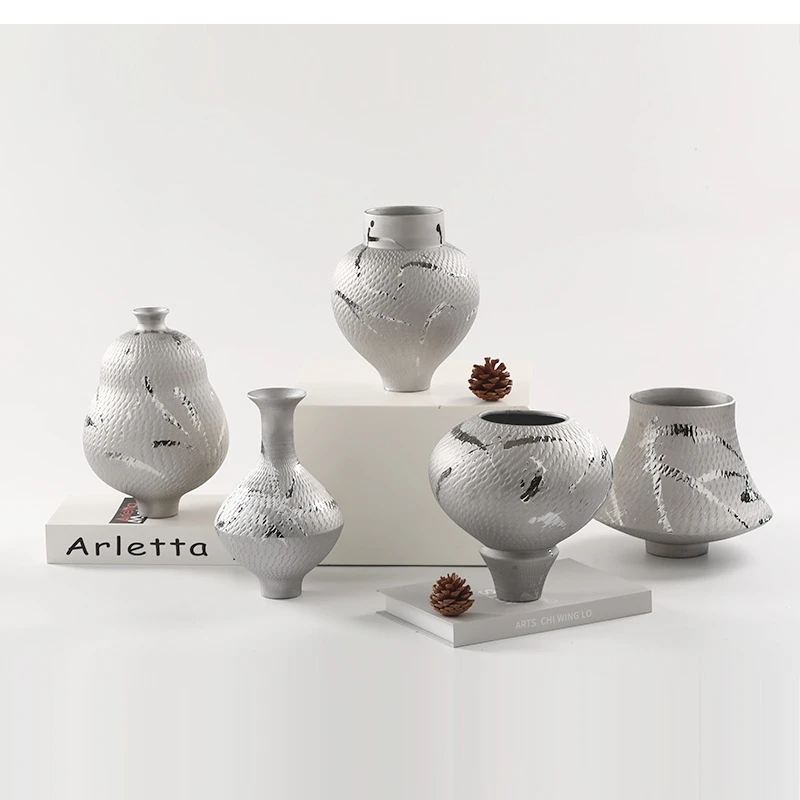 European modern light luxury silver ceramic decoration jars vase simple living room home pieces
European modern light luxury silver ceramic decoration jars vase simple living room home pieces