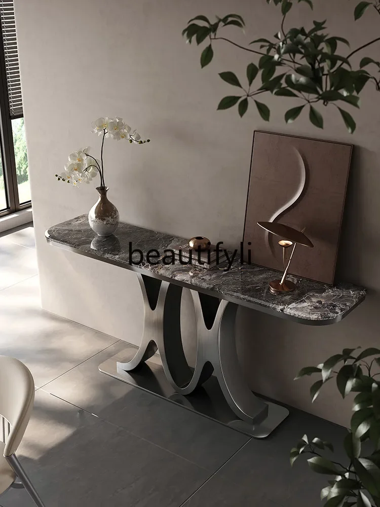 The entrance door is facing the designer entrance table, light luxury modern simple high-end marble strip case
The entrance door is facing the designer entrance table, light luxury modern simple high-end marble strip case