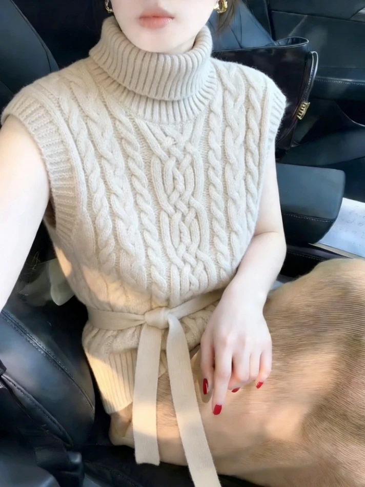 Женский вязаный жилет с высоким воротником, кружевной текстурой, поясом на талии, утягивающий, в стиле Lazy Chic, с эффектом высокого качества
Женский вязаный жилет с высоким воротником, кружевной текстурой, поясом на талии, утягивающий, в стиле Lazy Chic, с эффектом высокого качества