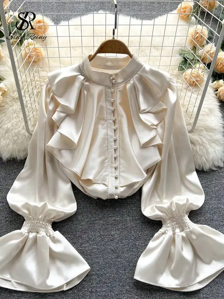 SINGREINY High Quality Satin Loose Shirt Long Flared Sleeves Ruffles O Neck Beading Women Gentle Office Lady Casual Blouse
SINGREINY High Quality Satin Loose Shirt Long Flared Sleeves Ruffles O Neck Beading Women Gentle Office Lady Casual Blouse