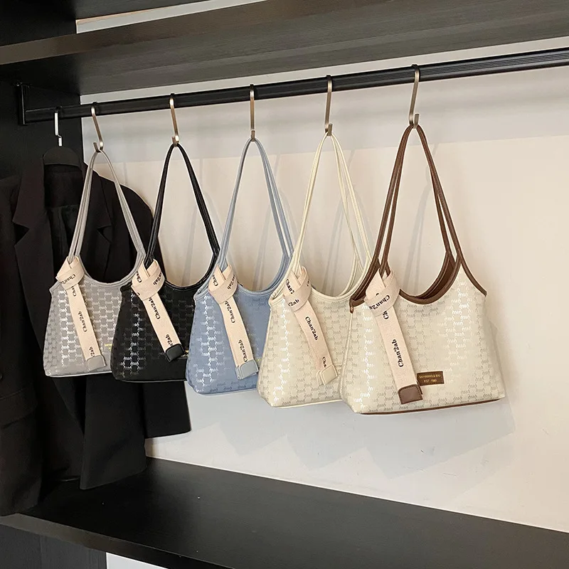 2025 Summer Women Korean Chic Tote Bag Large Capacity Underarm Shoulder Crossbody Purse
2025 Summer Women Korean Chic Tote Bag Large Capacity Underarm Shoulder Crossbody Purse
