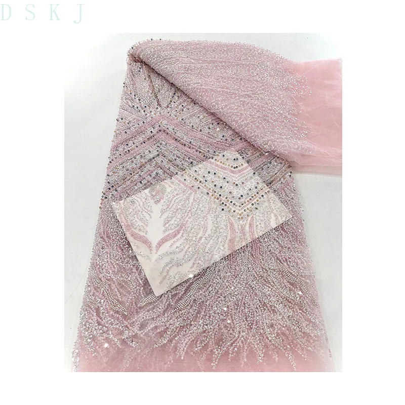 French pink lace fabric wedding dress African Nigeria heavy industry sequined embroidered beaded tubes, wedding dress production
French pink lace fabric wedding dress African Nigeria heavy industry sequined embroidered beaded tubes, wedding dress production