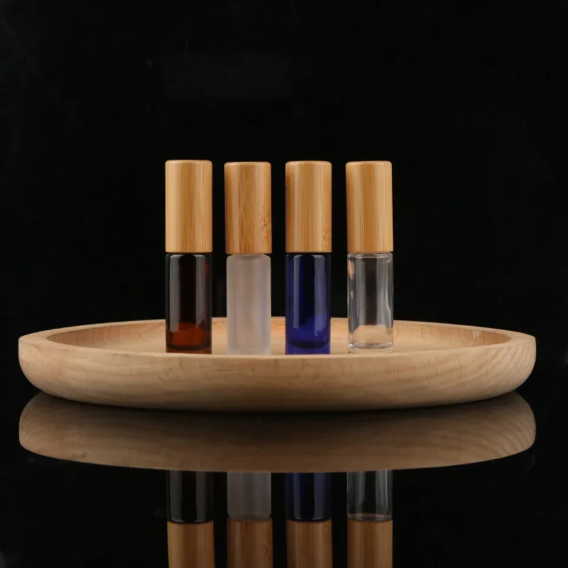 Bamboo Bottles Thick Amber frosted Glass Roll On Essential Oil Empty Perfume Bottle Stainless Glass Roller Ball with wood lids
Bamboo Bottles Thick Amber frosted Glass Roll On Essential Oil Empty Perfume Bottle Stainless Glass Roller Ball with wood lids