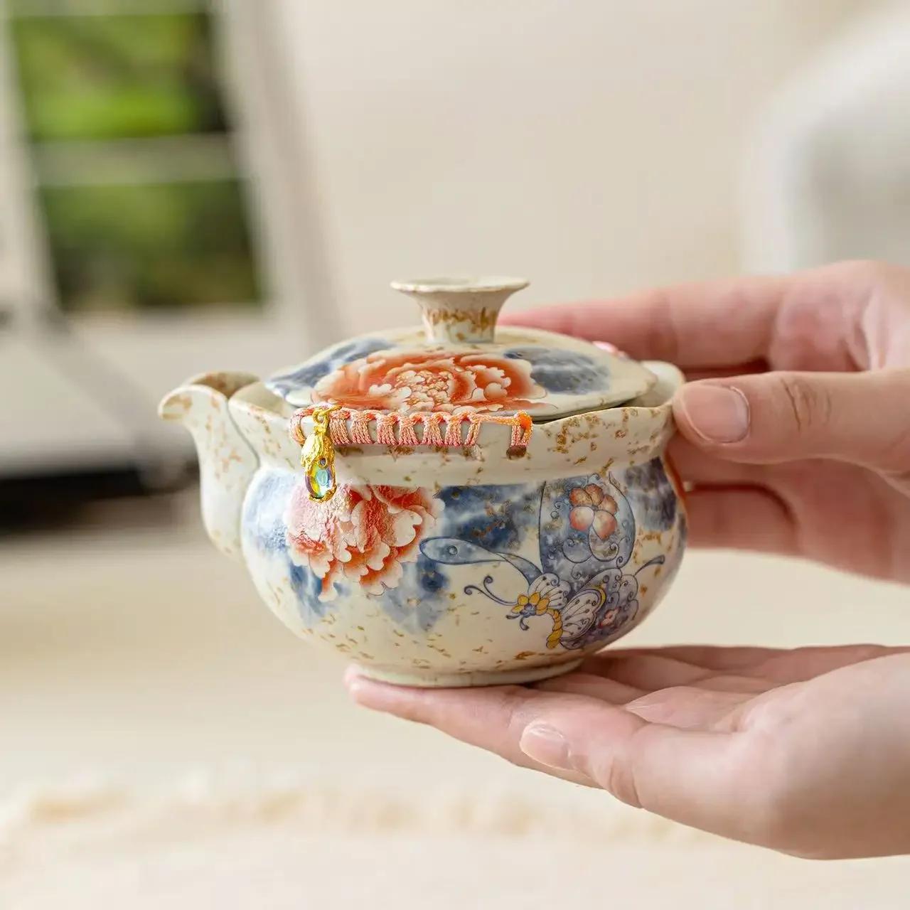 180ML Caramel Glaze Butterfly Love Peony Hand Grab Bottle Pot Chinese Brewing Teapot Household Ball Hole Filter Kung Fu Tea Set
180ML Caramel Glaze Butterfly Love Peony Hand Grab Bottle Pot Chinese Brewing Teapot Household Ball Hole Filter Kung Fu Tea Set