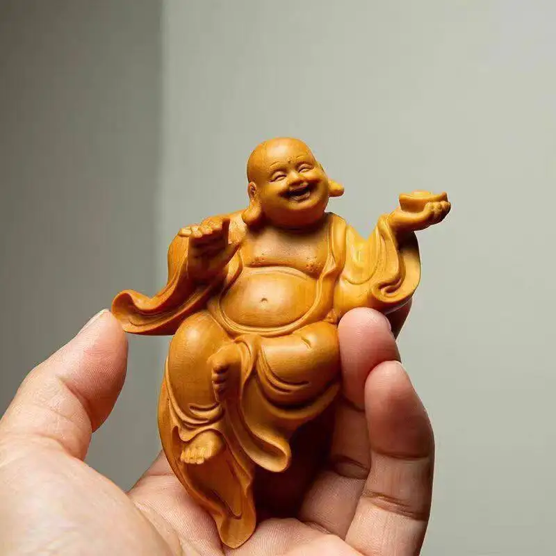 Cliff cypress wood carving gold ingot Maitreya Buddha statue ornament handle piece retro handicraft Chinese style decoration
Cliff cypress wood carving gold ingot Maitreya Buddha statue ornament handle piece retro handicraft Chinese style decoration