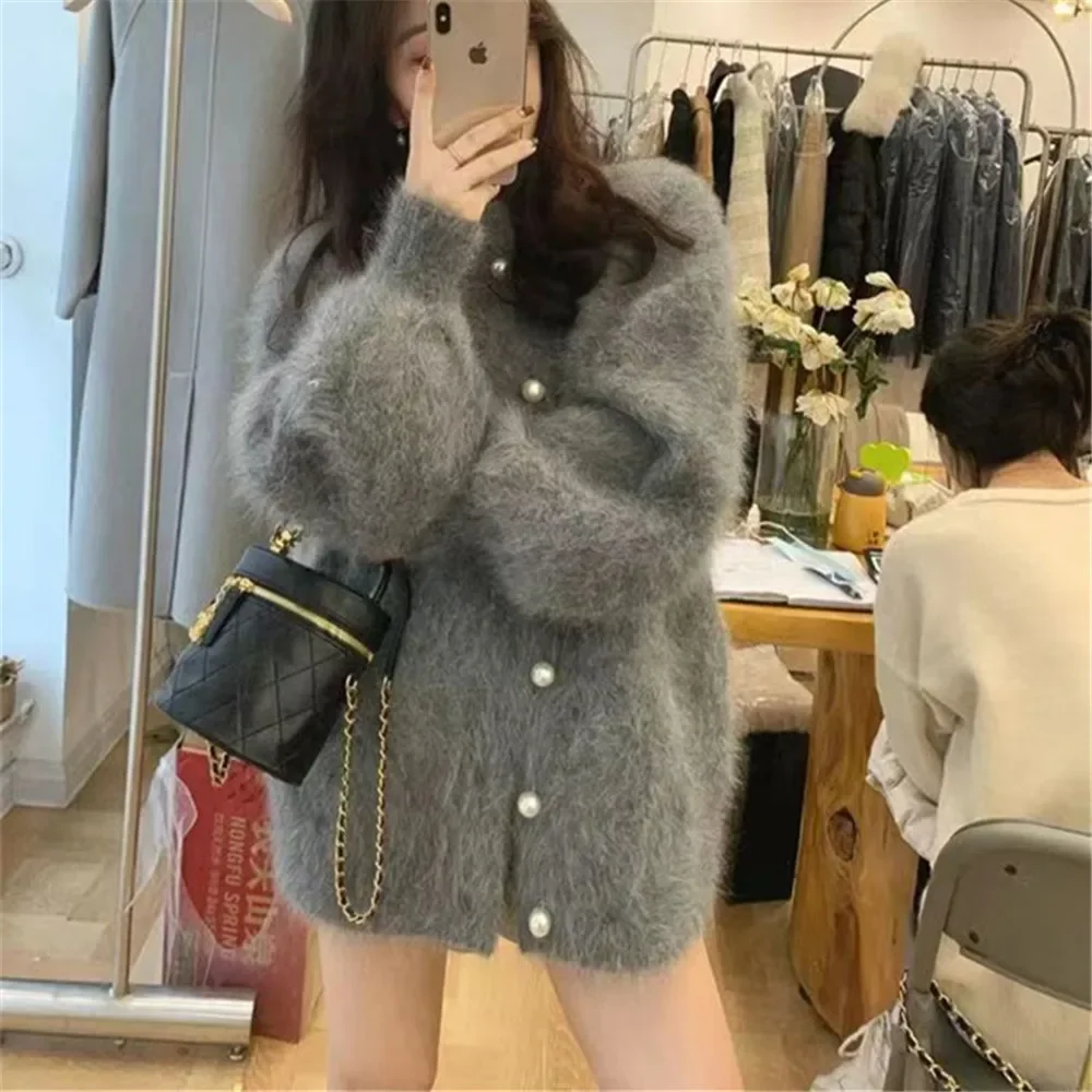 Breasted Jackets Warm Knitted Mink Cashmere Cardigans Sweater 2025 Autumn Winter Women Jumpers Oversized Casual Pearls Single
Breasted Jackets Warm Knitted Mink Cashmere Cardigans Sweater 2025 Autumn Winter Women Jumpers Oversized Casual Pearls Single