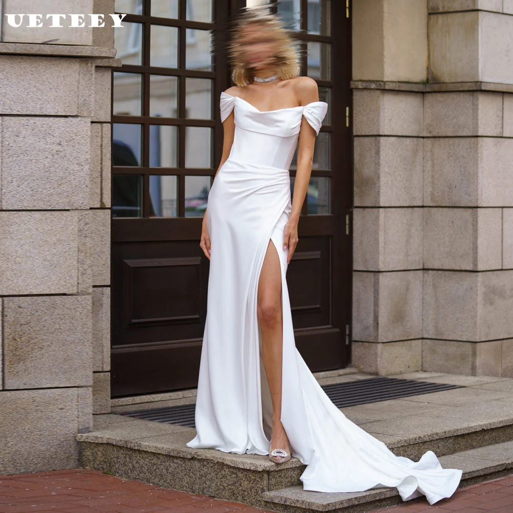 UETEEY Customized Simple Crepe Off Shoulder Pleats Mermaid Wedding Dress Women Zipper Back Long Sleeves High Slit Bridal Gown
UETEEY Customized Simple Crepe Off Shoulder Pleats Mermaid Wedding Dress Women Zipper Back Long Sleeves High Slit Bridal Gown