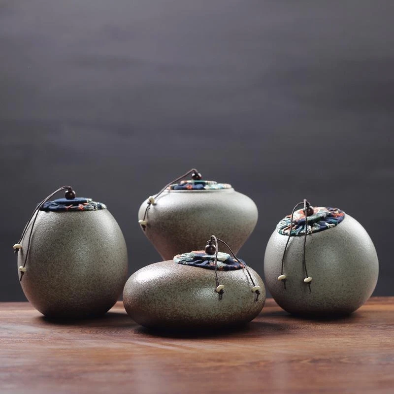 Creative Japanese Tea Canister Handmade Coarse Pottery Sealed Canister Kung Fu Tea Set Ceramic Canister Food Storage Container
Creative Japanese Tea Canister Handmade Coarse Pottery Sealed Canister Kung Fu Tea Set Ceramic Canister Food Storage Container