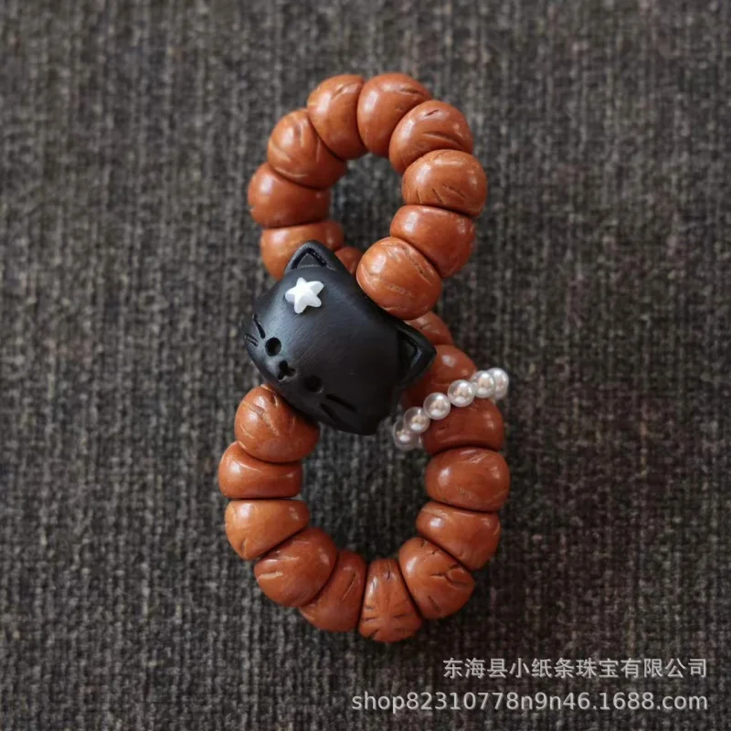 New product: Peach stone and black ebony bear charm bracelet, fashionable accessory
New product: Peach stone and black ebony bear charm bracelet, fashionable accessory