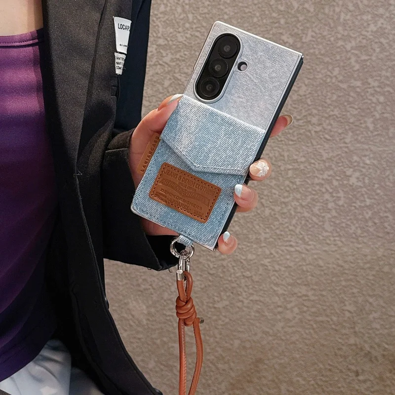 Fashion Leather Card Bag Denim Cloth Phone Case For Samsung Z Fold 7 6 5 ZFold6 ZFold5 Protective Cover with Hand Rope Cute Case
Fashion Leather Card Bag Denim Cloth Phone Case For Samsung Z Fold 7 6 5 ZFold6 ZFold5 Protective Cover with Hand Rope Cute Case