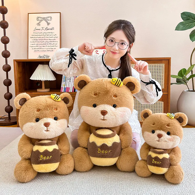 Cute Honey Pot Bear Plush Toy, Soft Fluffy Teddy Bear with Bee and Honey Jar for gifts.
Cute Honey Pot Bear Plush Toy, Soft Fluffy Teddy Bear with Bee and Honey Jar for gifts.