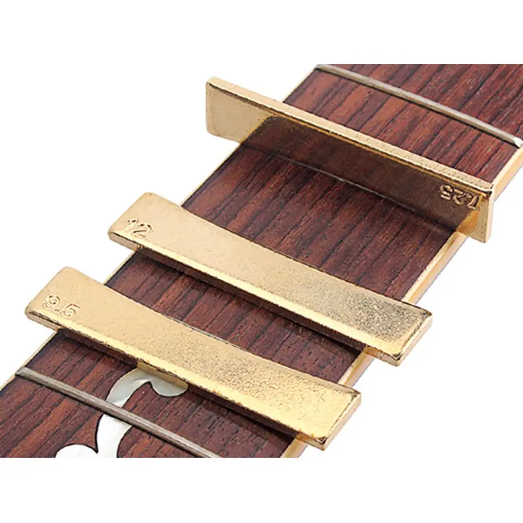Латунный ладовый пресс-вставка, золотой металлический гитарный ладовый пресс, аксессуар для гитары, инструмент для ремонта электрогитары
Латунный ладовый пресс-вставка, золотой металлический гитарный ладовый пресс, аксессуар для гитары, инструмент для ремонта электрогитары