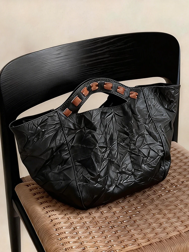 Black Pleated Retro Tote Bag Women's 2026 New Luxury Minimalist High-End Handbag Shoulder Crossbody Bag Summer Soft Handle
Black Pleated Retro Tote Bag Women's 2026 New Luxury Minimalist High-End Handbag Shoulder Crossbody Bag Summer Soft Handle
