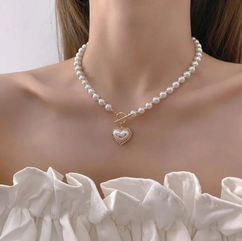 South Korea ins super fairy temperament pearl love necklace, cold wind, sweet and simple OT buckle collarbone chain woman
South Korea ins super fairy temperament pearl love necklace, cold wind, sweet and simple OT buckle collarbone chain woman