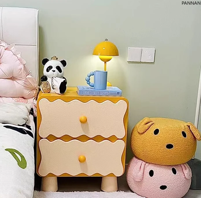 Creative bedside table household bedroom cream style modern children's simple storage locker
Creative bedside table household bedroom cream style modern children's simple storage locker