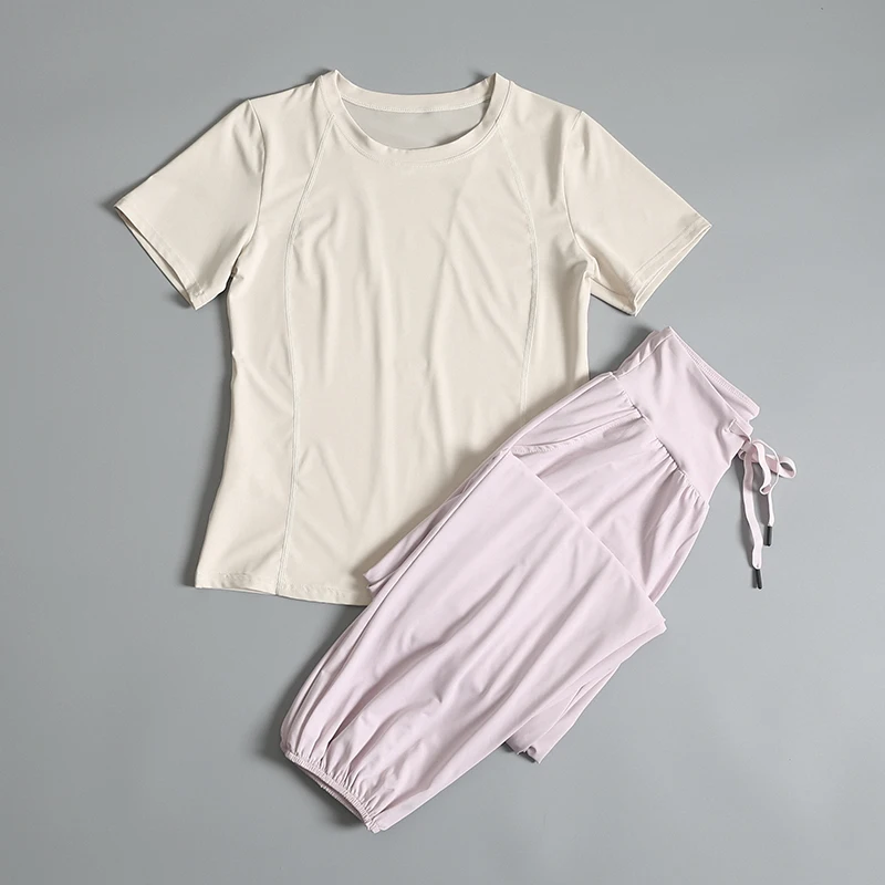 Yoga suit women's new high-end sports top Pilates training running fitness short-sleeved trousers set
Yoga suit women's new high-end sports top Pilates training running fitness short-sleeved trousers set