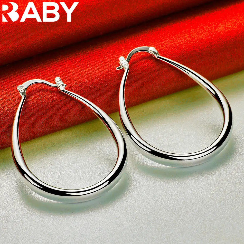 URBABY 925 Sterling Silver 41mm Water Droplet Hoop Earrings For Women Fashion Charm Jewelry Engagement Wedding Accessories
URBABY 925 Sterling Silver 41mm Water Droplet Hoop Earrings For Women Fashion Charm Jewelry Engagement Wedding Accessories