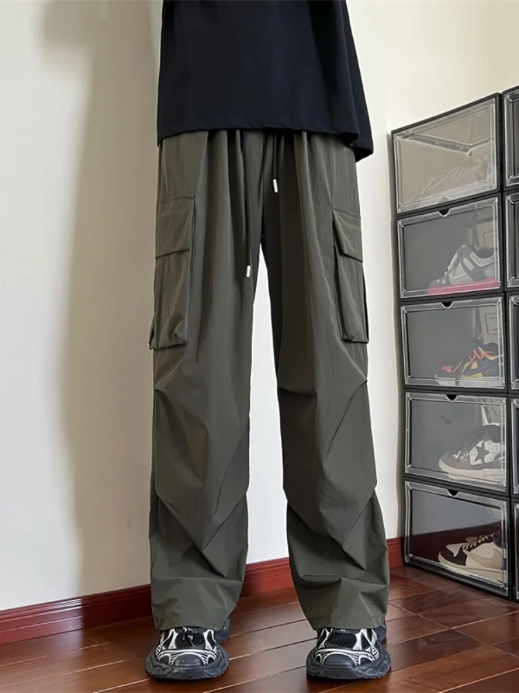 Мужские повседневные тонкие свободные брюки-карго с множеством карманов, прямые, быстросохнущие, модные, молодежные, для активного отдыха, весна-осень
Мужские повседневные тонкие свободные брюки-карго с множеством карманов, прямые, быстросохнущие, модные, молодежные, для активного отдыха, весна-осень