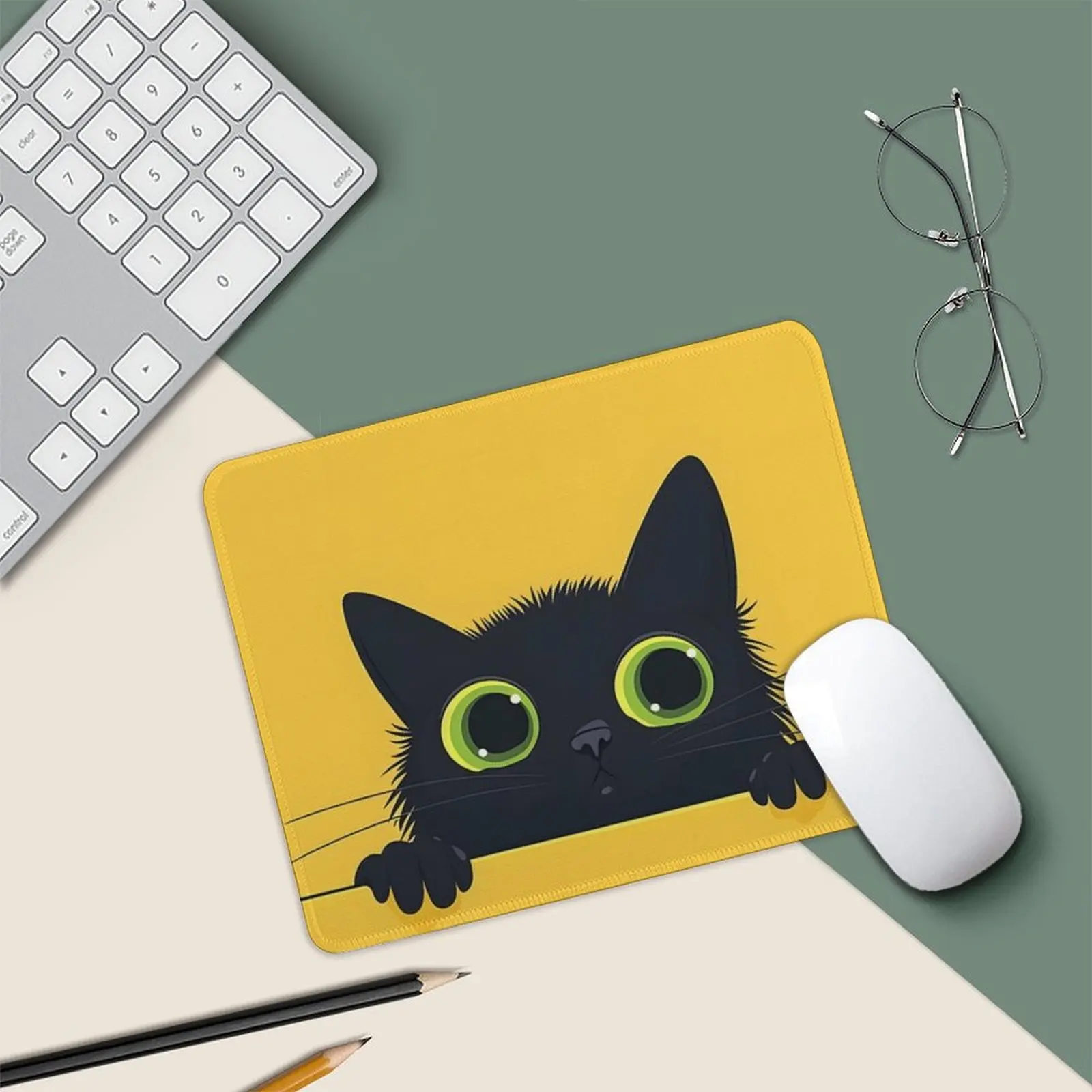 The cute black cat pattern mouse pad with a yellow background and green eyes is suitable for both home and office use
The cute black cat pattern mouse pad with a yellow background and green eyes is suitable for both home and office use