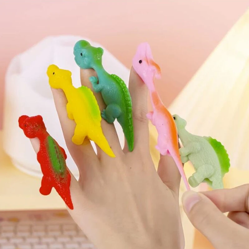 Резиновые игрушки-динозавры для запуска с пальца, забавные сувениры для вечеринок, подарки для детей, угощения для гостей на день рождения
Резиновые игрушки-динозавры для запуска с пальца, забавные сувениры для вечеринок, подарки для детей, угощения для гостей на день рождения