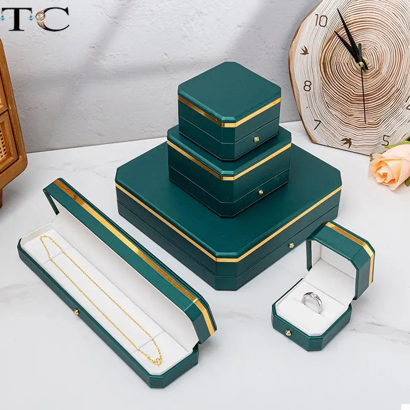 Octagonal PU Leather Jewelry Box Set for Rings Necklaces Bracelets and Pendants Red and Green with Gold Trim Business Style
Octagonal PU Leather Jewelry Box Set for Rings Necklaces Bracelets and Pendants Red and Green with Gold Trim Business Style