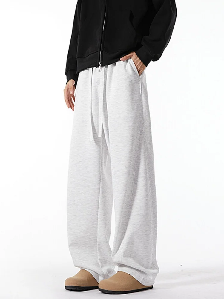 Повседневные американские брюки свободного кроя с широкими штанинами на весну-осень, прямые спортивные брюки, струящиеся брюки-кюлоты
Повседневные американские брюки свободного кроя с широкими штанинами на весну-осень, прямые спортивные брюки, струящиеся брюки-кюлоты