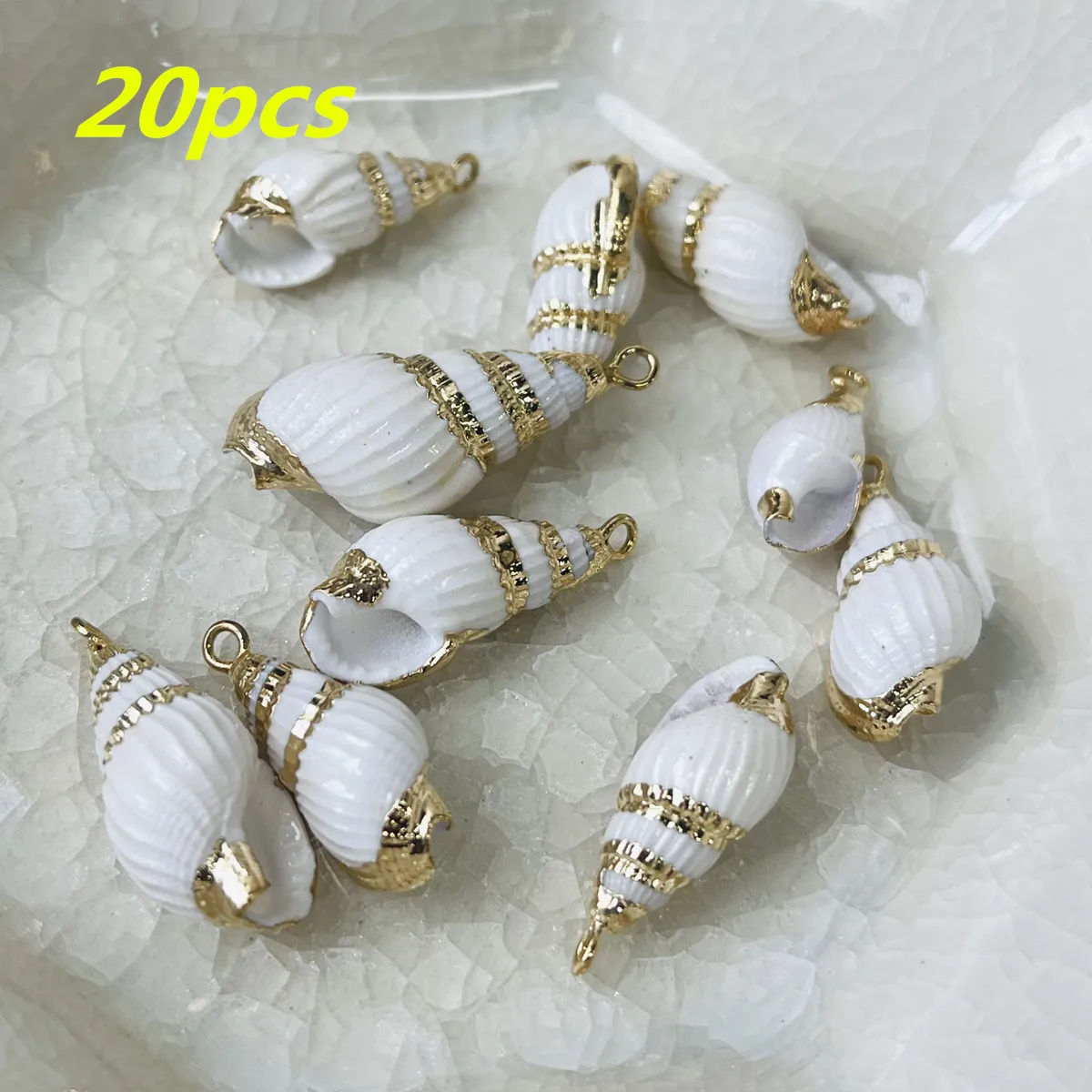 20Pcs Wholesale Small Pendant Conch Wrapped Golden Electroplated Pendant 5-10mmx15-30mmFor Jewelry Making DIY Necklace Accessory
20Pcs Wholesale Small Pendant Conch Wrapped Golden Electroplated Pendant 5-10mmx15-30mmFor Jewelry Making DIY Necklace Accessory