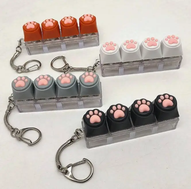 1pc Fingertip Novelty Slow Rising Stress Relief Toy, Keypad Styled, With Soft Silicone Cat Paw Design Keychain, Pendant
1pc Fingertip Novelty Slow Rising Stress Relief Toy, Keypad Styled, With Soft Silicone Cat Paw Design Keychain, Pendant