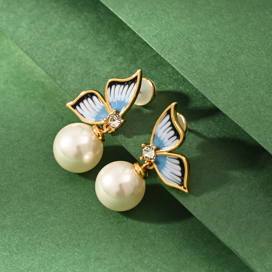 Bohemia Style New Year National Fashion Temperament Enamel Glaze Butterfly Pearl Earrings 925 Sterling Silver Needle Earrings
Bohemia Style New Year National Fashion Temperament Enamel Glaze Butterfly Pearl Earrings 925 Sterling Silver Needle Earrings
