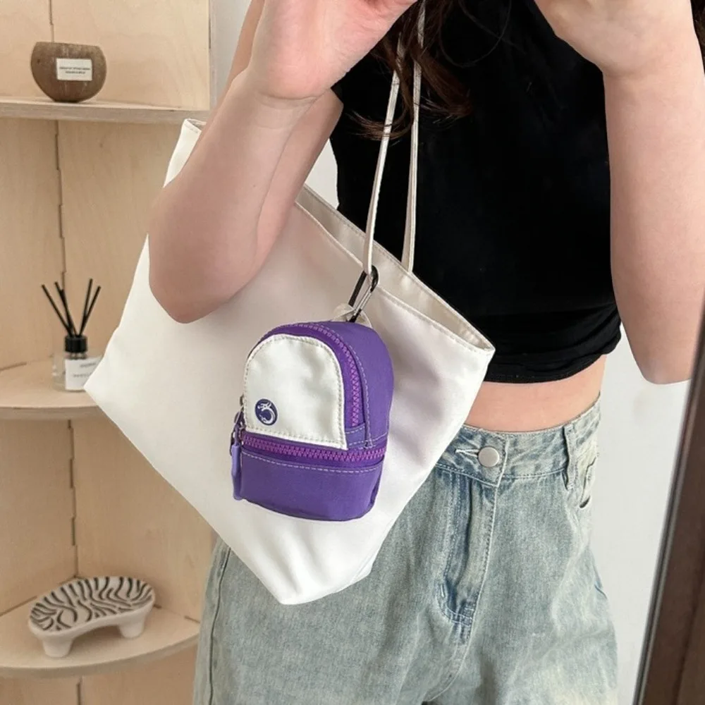 Oxford Cloth Hanging Neck Coin Purse Backpack Pendant Korean Style Anti-theft Earphone Storage Bag Portable Sling
Oxford Cloth Hanging Neck Coin Purse Backpack Pendant Korean Style Anti-theft Earphone Storage Bag Portable Sling