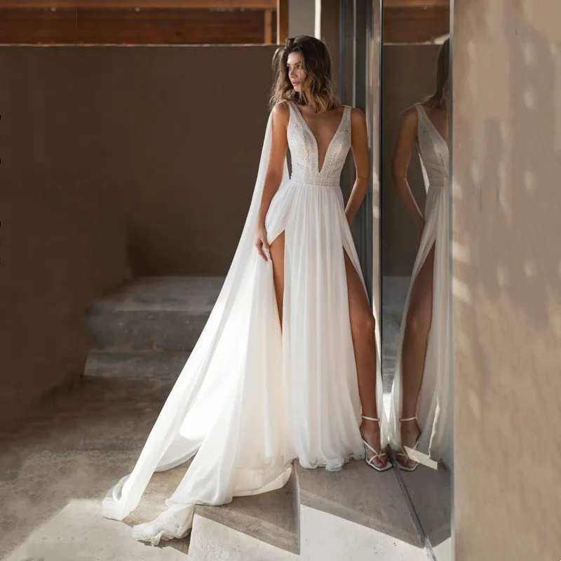 Boho Sleeveless A-Line Ivory Lace Sexy Backless Deep V-Neck Chiffon Spaghetti Straps Long Dress Side Slit Formal 2025 Customized
Boho Sleeveless A-Line Ivory Lace Sexy Backless Deep V-Neck Chiffon Spaghetti Straps Long Dress Side Slit Formal 2025 Customized