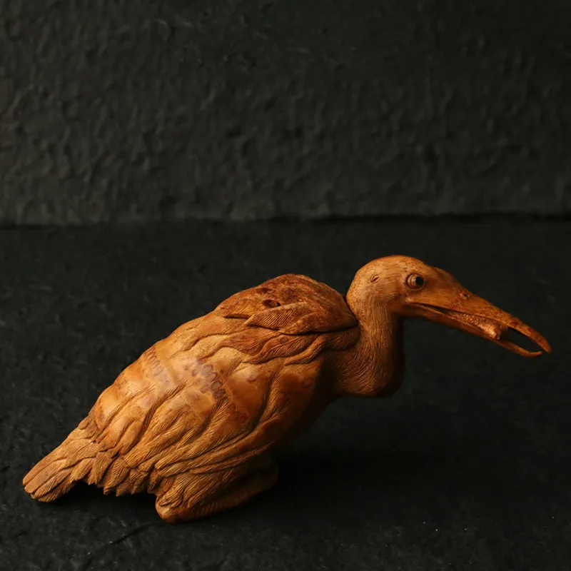A hand-carved "bird" incense burner integrated bamboo root small ornament
A hand-carved "bird" incense burner integrated bamboo root small ornament