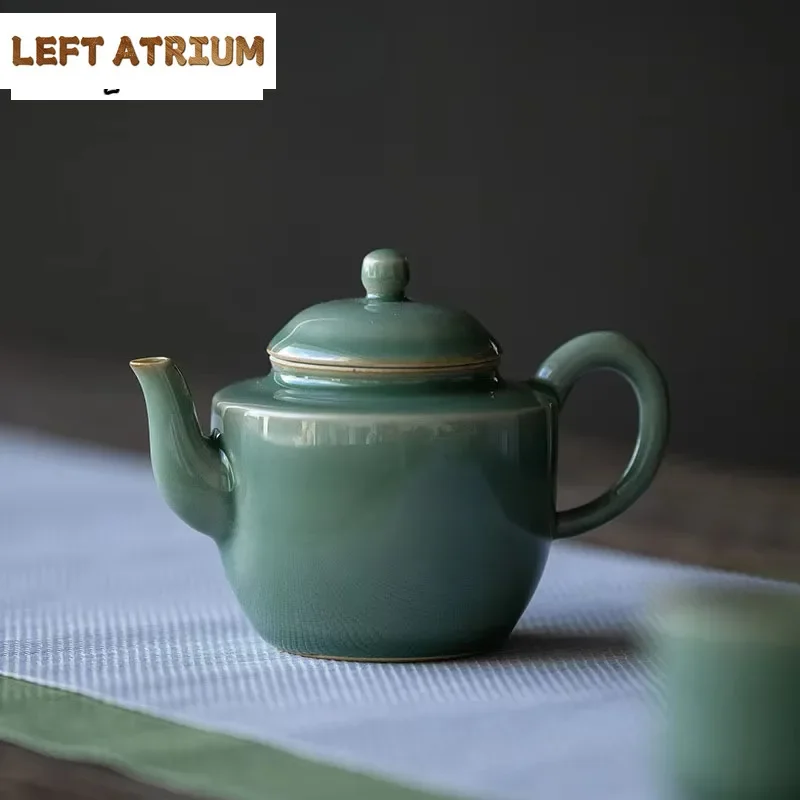 125ml Yue Kiln Celadon Ceramic Teapot Handmade Tea Maker Small Tea Pot With Filter Hole Household Single Pot Kung Fu Teaware Set
125ml Yue Kiln Celadon Ceramic Teapot Handmade Tea Maker Small Tea Pot With Filter Hole Household Single Pot Kung Fu Teaware Set