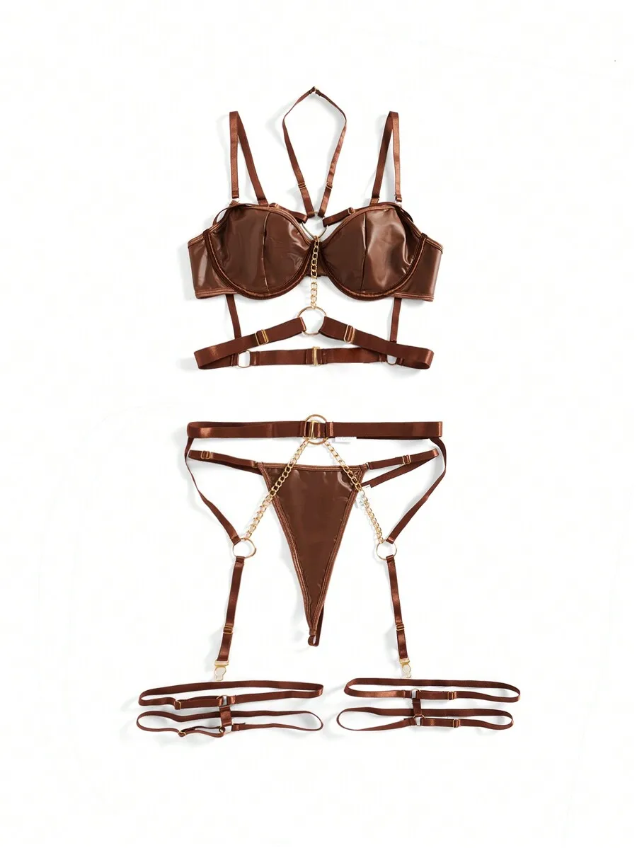 Patent Leather Underwire Bra And Garter Belt Set With Chain Detail
Patent Leather Underwire Bra And Garter Belt Set With Chain Detail