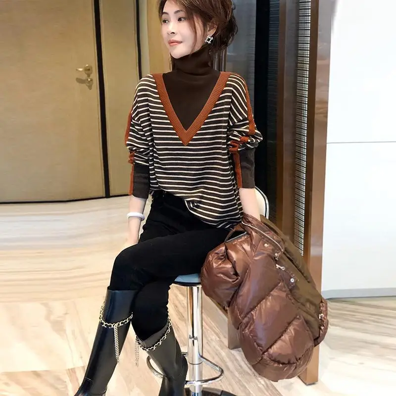 High-neck striped pullover sweater women fake two-piece design inside knitted sweater autumn and winter pullover sweater female
High-neck striped pullover sweater women fake two-piece design inside knitted sweater autumn and winter pullover sweater female