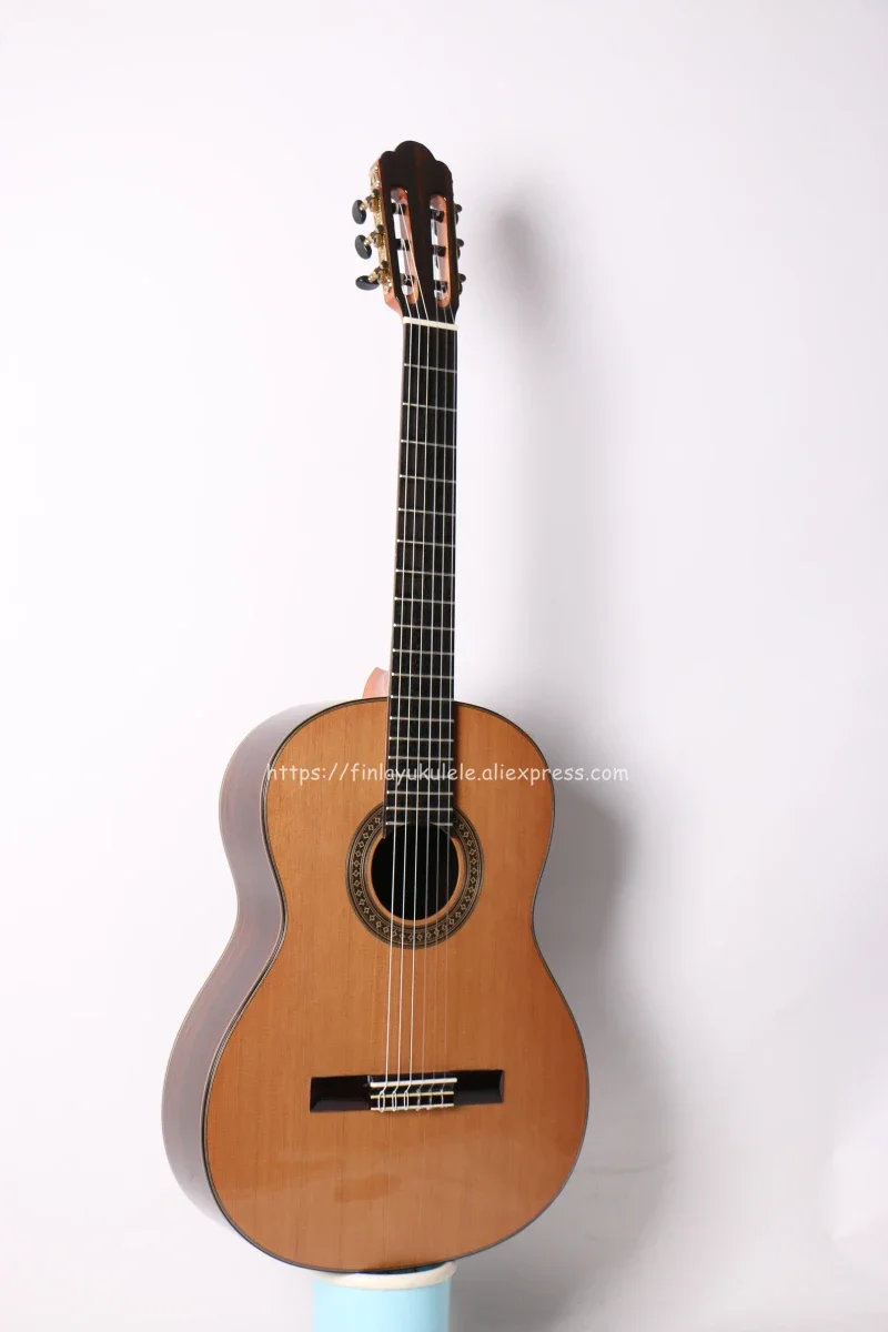 Finlay 39 inch Handmade Spanish guitar,With SOLID Cedar Top/Rosewood body,with Nylon string,classical guitarras,650mm 52mm nut
Finlay 39 inch Handmade Spanish guitar,With SOLID Cedar Top/Rosewood body,with Nylon string,classical guitarras,650mm 52mm nut