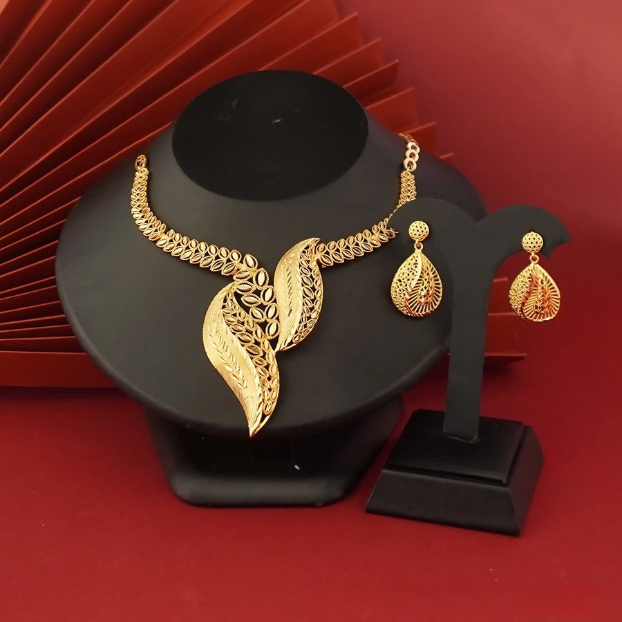9999 Gold Hollow Jewelry Tassel Set, Elegant Leaf Earrings and Women's Premium Accessory Leaf Pendant Necklace
9999 Gold Hollow Jewelry Tassel Set, Elegant Leaf Earrings and Women's Premium Accessory Leaf Pendant Necklace